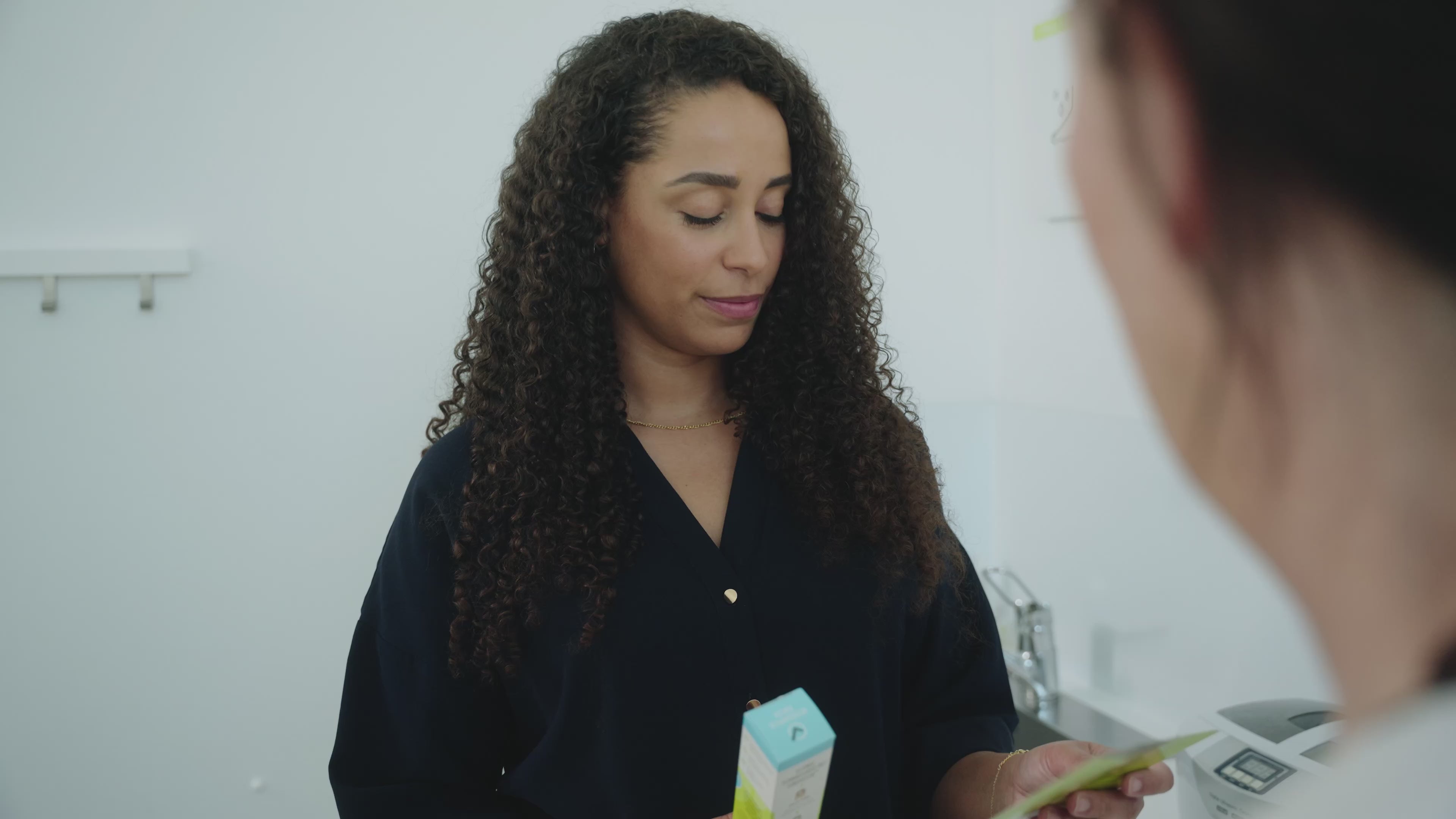 Load video: Patient getting instructions on how to use FunghiClear to fight toenail fungus. She gets these instructions from a foot care professional. 